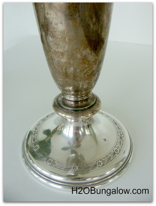 antique silver vase with clean base after being cleaned with natural ingredients