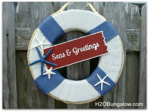 Seas and Greetings DIY Costal Christmas Wreath with tutorial. Hang one on your door and get into the Nautical Christmas spirit this holiday season! www.H2OBungalow #nauticalchristmas