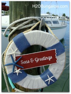 Seas and Greetings DIY Costal Christmas Wreath with tutorial. Hang one on your door and get into the Nautical Christmas spirit this holiday season! www.H2OBungalow #nauticalchristmas