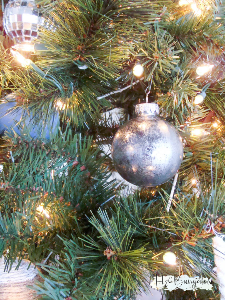 DIY mercury glass Christmas ornament hanging on Christmas tree