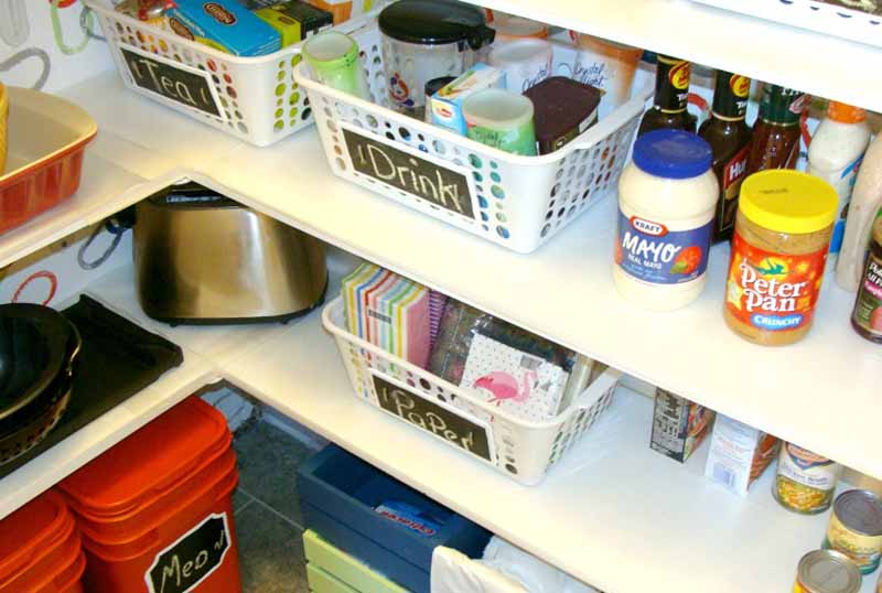 pantry shelves with baskets and food items