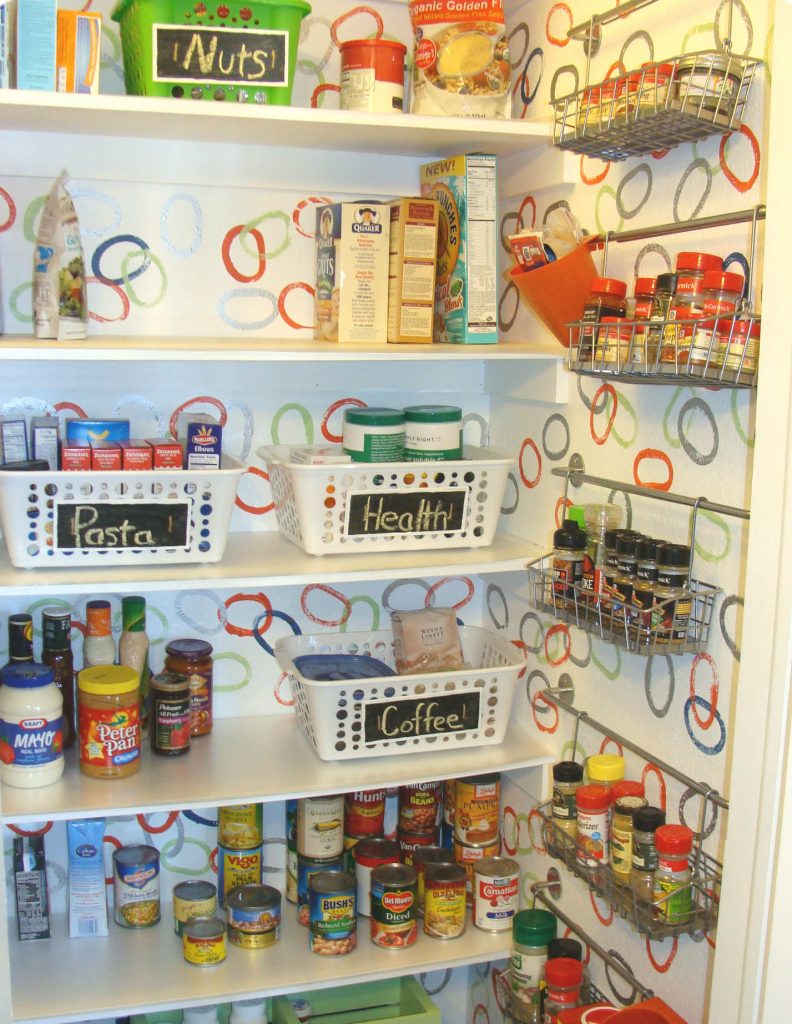 image of pantry shelves organized with bins