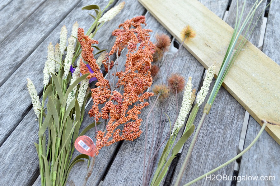 It looks like pallet wood, it's still rough cut with texture and character, but you don't have to anything apart! Make this simple wood trough box from a new fence post . Add a stencil and you've got a super fall decor item. www.H2OBungalow.com #falldecor #fall #powertoolproject