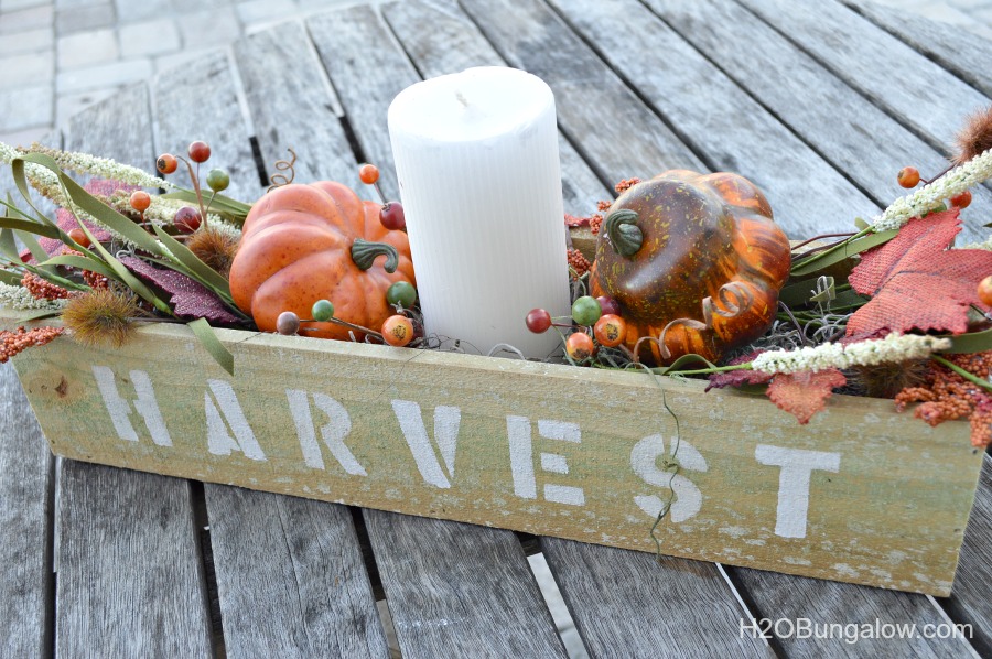 It looks like pallet wood, it's still rough cut with texture and character, but you don't have to anything apart! Make this simple wood trough box from a new fence post . Add a stencil and you've got a super fall decor item. www.H2OBungalow.com #falldecor #fall #powertoolproject