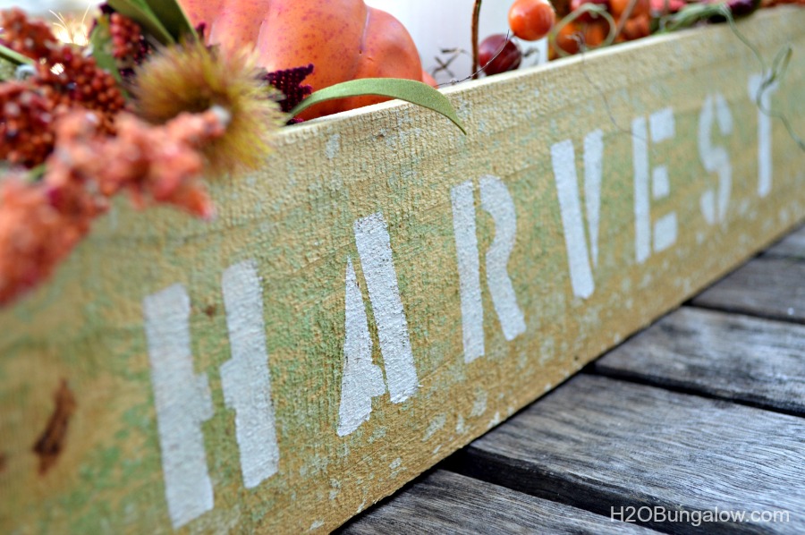 It looks like pallet wood, it's still rough cut with texture and character, but you don't have to anything apart! Make this simple wood trough box from a new fence post . Add a stencil and you've got a super fall decor item. www.H2OBungalow.com #falldecor #fall #powertoolproject
