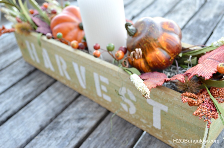 It looks like pallet wood, it's still rough cut with texture and character, but you don't have to anything apart! Make this simple wood trough box from a new fence post . Add a stencil and you've got a super fall decor item. www.H2OBungalow.com #falldecor #fall #powertoolproject