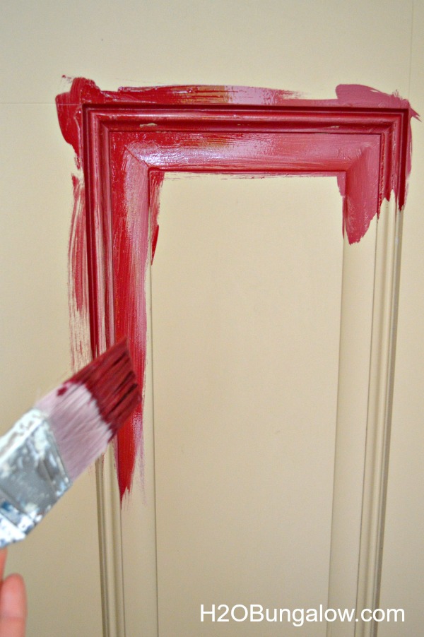 Applying paint to the inner panel on the front door.