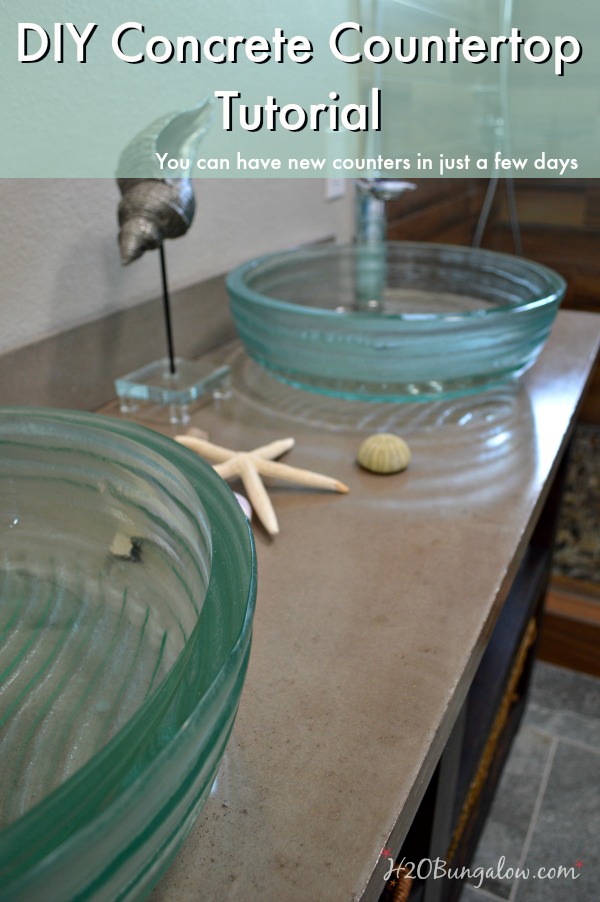  DIY concrete countertop with two aqua sinks and starfish on counter