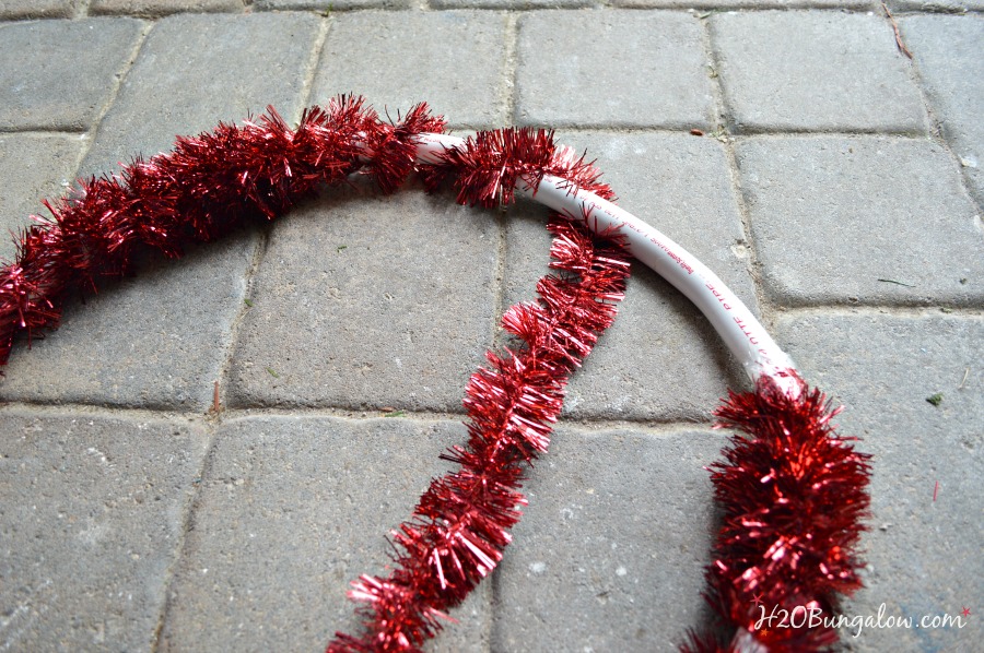 Wrap-tinsel-around-outdoor-pvc-Christmas-decorations-H2OBungalow