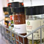 Organize-spices-on-a-wall-to-save-counter-space-H2OBungalow