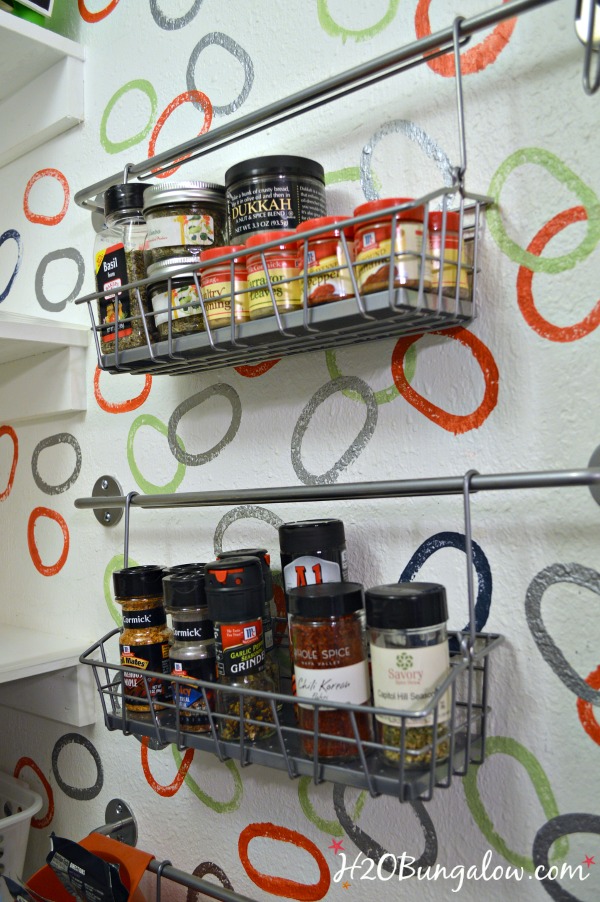 https://h2obungalow.com/wp-content/uploads/2015/01/Organized-spice-rack-on-a-wall-saves-space-in-a-small-kitchen-H2OBungalow.jpg