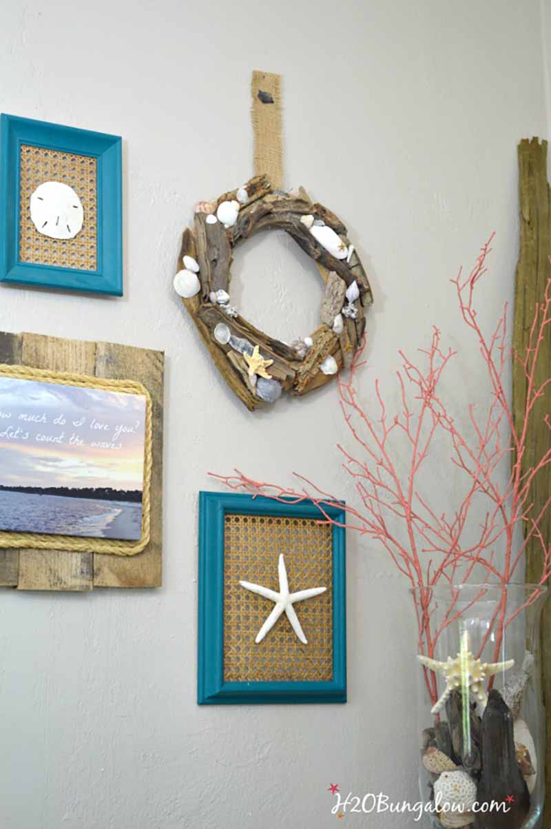 gallery wall of coastal items