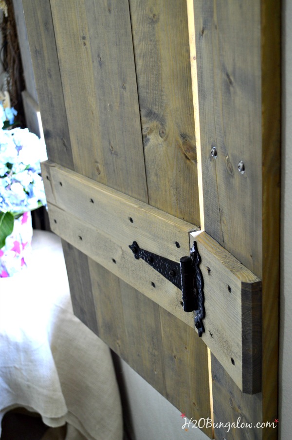 Build your own set of old world inspired wood shutters. Finish raw wood with an aging product and you have a realistic vintage appeal on a DIY budget! Good tutorial. www.H2OBungalow.com #woodworking #powertoolproject