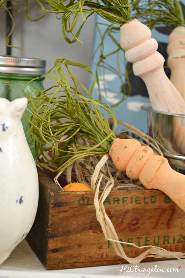 Make spindle Easter carrots out of wood spindles from an old bed frame or chair. east DIY tutorial for this simple Easter decoration