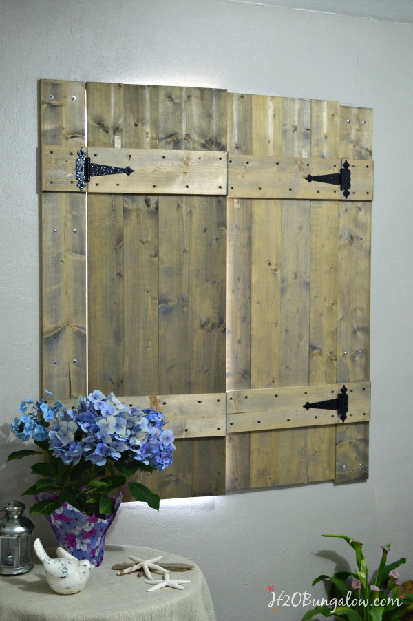 Build your own set of old world inspired wood shutters. Finish raw wood with an aging product and you have a realistic vintage appeal on a DIY budget! Good tutorial. www.H2OBungalow.com #woodworking #powertoolproject