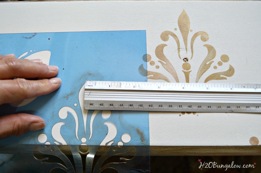 Stenciled-damask-onto-distressed-fresser-drawer-H2OBungalow