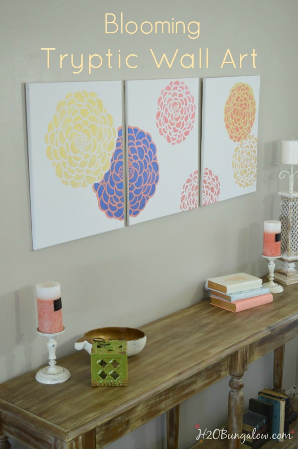 This large blooming tryptic wall art looks like it came from a gallery but it's a DIY project! Easy to make with stencils and plain canvases. H2OBungalow
