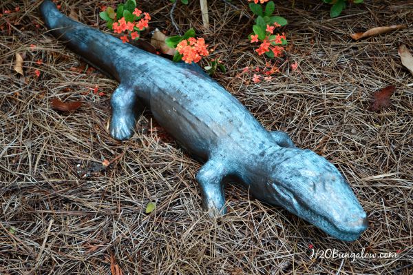 A DIY faux painted bronze garden statue was easy to make in a few hours, took little to no special skill and looks just like the big budget bronze statues that cost hundreds of dollars. See how in this easy tutorial by H2OBungalow.com #fauxpaint #yardart #gardendecor