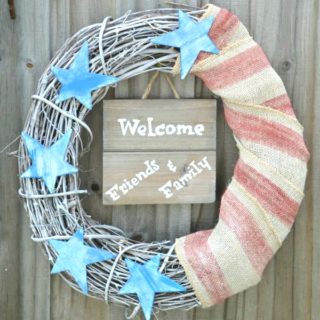 Welcome your guests at the front door with a fun patriotic wreath. Easy DIY for Labor Day, Memorial Day and Fourth of July. www.H2OBungalow.com #patriotic #redwhiteandblue
