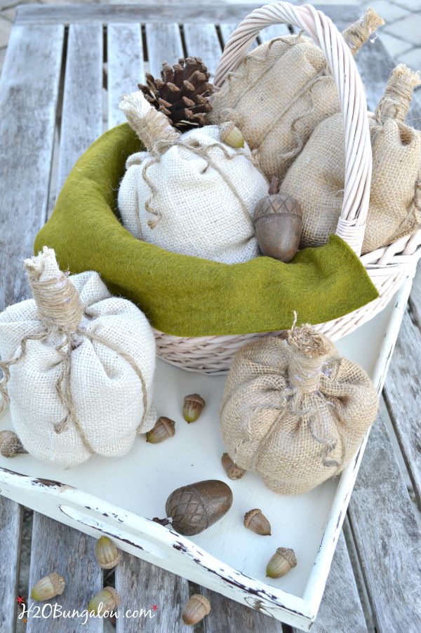 Simple no sew burlap pumpkin tutorial. Whip these darling pumpkins up in no time at all, use as a table decoration, as name tags for place settings or fill a basket for an entryway seasonal vignette. www.H2OBungalow.com #pumpkin #falldecor