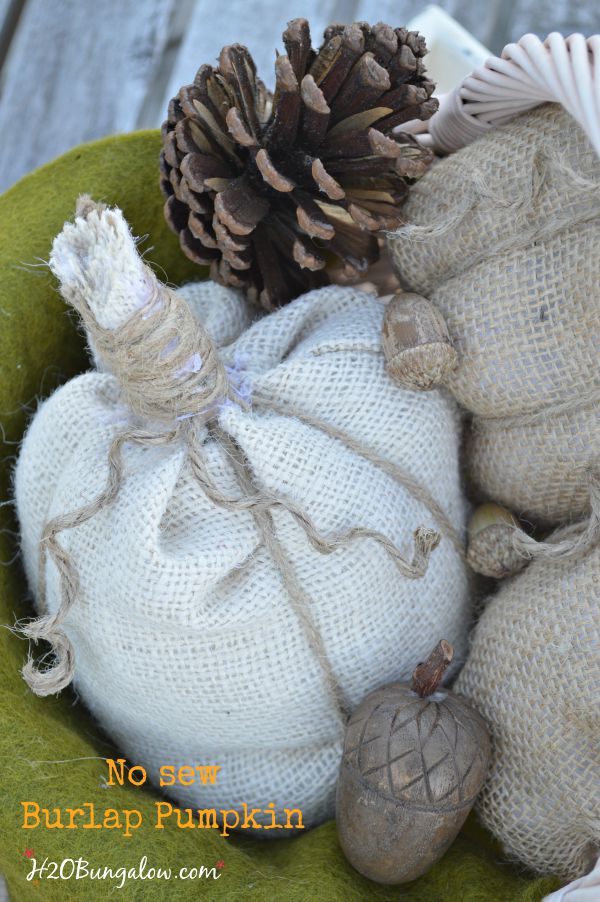 Simple no sew burlap pumpkin tutorial. Whip these darling pumpkins up in no time at all, use as a table decoration, as name tags for place settings or fill a basket for an entryway seasonal vignette. www.H2OBungalow.com #pumpkin #falldecor 