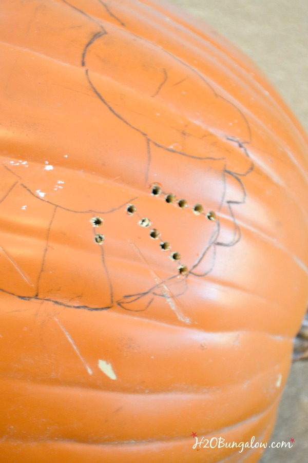 How to drill a pumpkin.  Use a simple drill and pattern to make a fall decor pumpkin. Get a free pattern to drill a pumpkin #pumpkin #pumpkindecor #fallDIY #h2obungalow