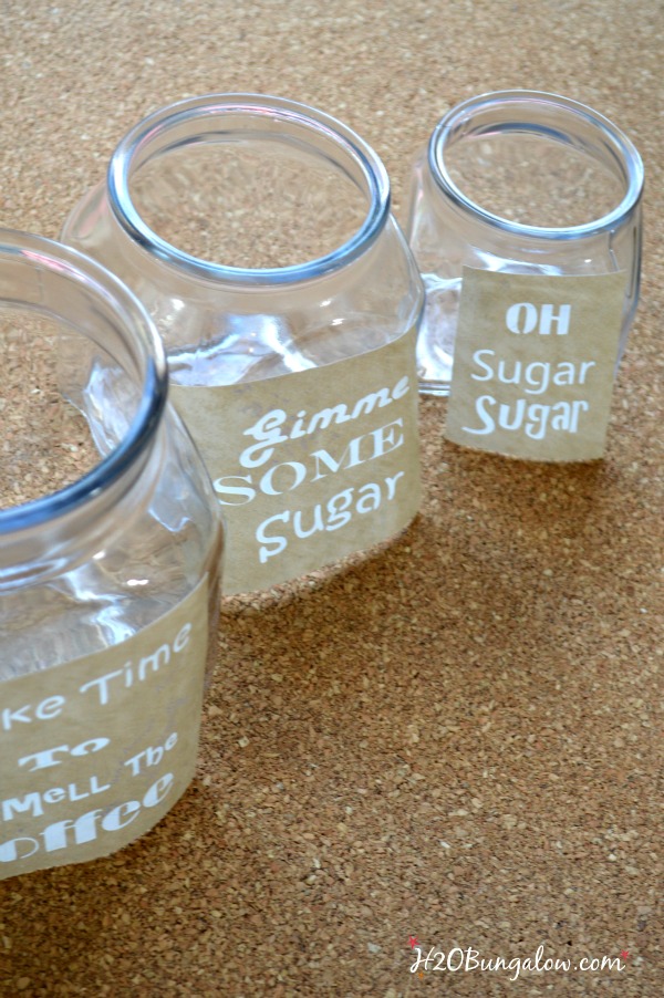 DIY etched glass coffee station canisters are smart space savers in a small kitchen. Serve and store canisters always look great in the pantry or on the counter! Click through to the ultimate organization Tour for this and may other cleaning and organization projects you'll love H2OBungalow.com #organize