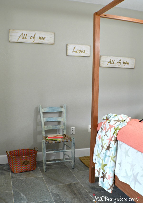 DIY Tutorial for a romantic word phrase wall plaque using All of Me Loves All of You stenciled in aged gold on white. Lovely, simple and trendy. Simple tutorial. www.H2OBungalow.com #Love 