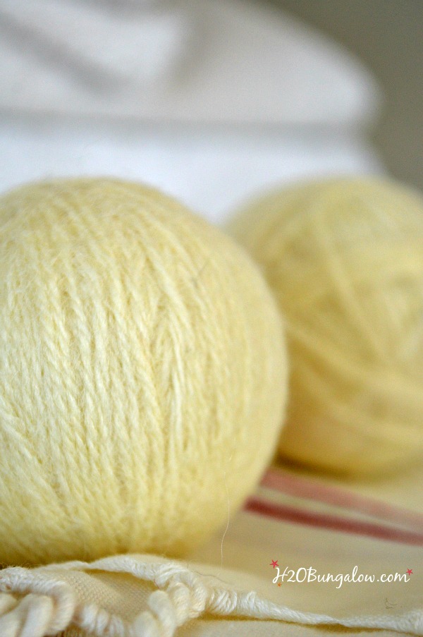 DIY felted wool dryer balls tutorial with Young Living Essential Oils softens clothes, helps keep wrinkles down and helps dry clothes evenly as well as eliminates dryer sheet chemicals. - www.H2OBungalow.com 