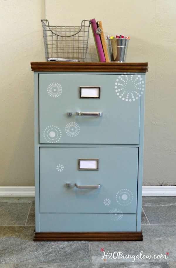 Use a thrift store cast off for this project. DIY tutorial for upcycled painted and stenciled filing cabinet makeover with stained wood top and bottom. Add style to your office a budget. H2OBunglow.com 