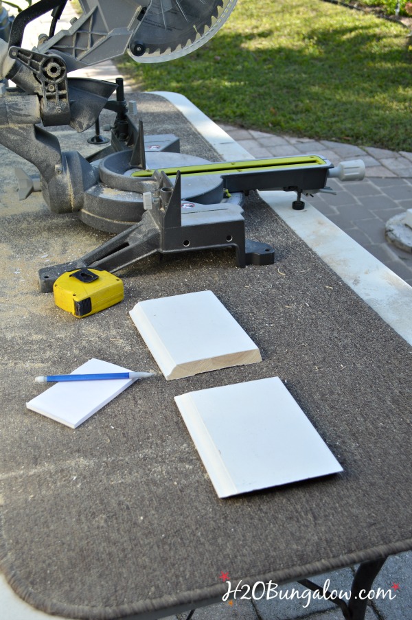 miter saw set up for DIY baseboards 