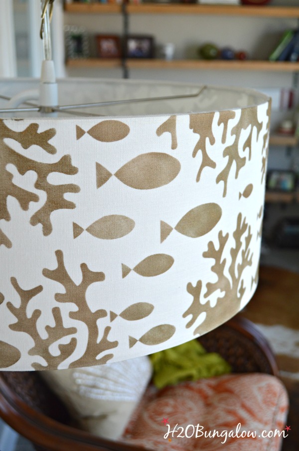 Tutorial to show how to make an simple stenciled DIY hanging pendant light from a drum lampshade, a chain and a light conversion kit. Easy DIY.