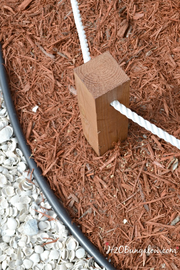 DIY coastal rope garden border fence tutorial. Works for any size area, make a rope fence short or tall. Simple one day DIY H2OBungalow