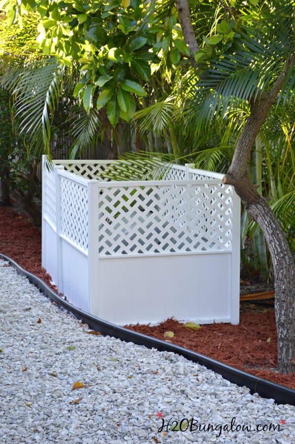 hide outdoor ugly tanks with fencing 