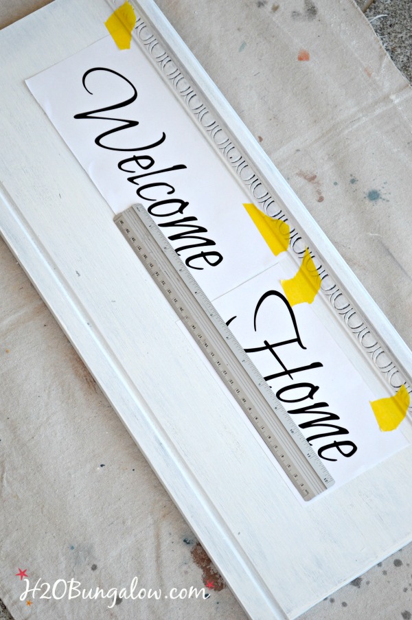 Easy DIY tutorial to make a repurposed headboard coat rack with "Welcome Home" saying. Easy bed headboard upcycle project. 