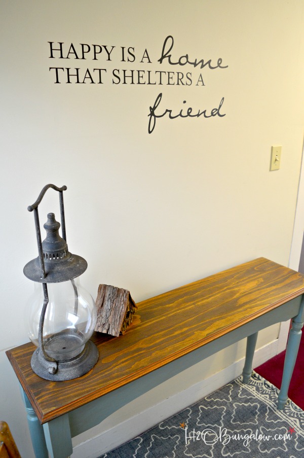 Blue painted console table makeover with Nantucket Blue Reclaim Paint and Glaze with a beautiful stained wood top transformed the old table. by H2OBungalow 