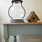 Blue painted console table makeover with Nantucket Blue Reclaim Paint and Glaze with a beautiful stained wood top transformed the old table. by H2OBungalow