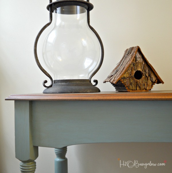 Blue painted console table makeover with Nantucket Blue Reclaim Paint and Glaze with a beautiful stained wood top transformed the old table. by H2OBungalow 