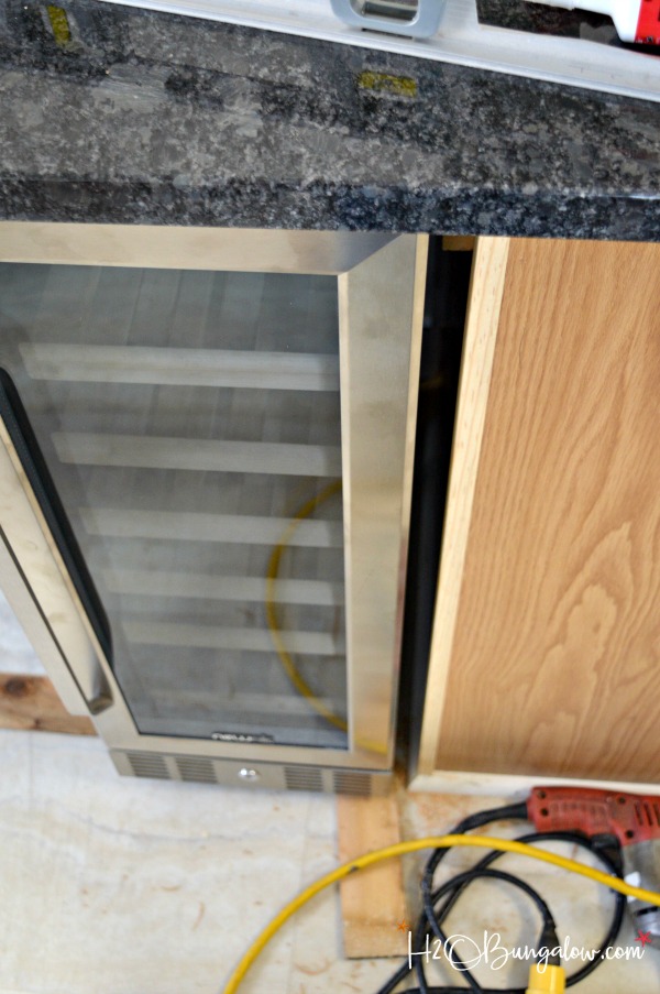 Simple tutorial instructions to make a DIY built in wine cooler in your kitchen. Built in wine refrigerators look great and increase the value of a home