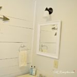 DIY tutorial on how to paint a metal light fixture and change the finish without taking it down from the wall or ceiling. What to use and how to do it. Save big budget dollars with this DIY project.