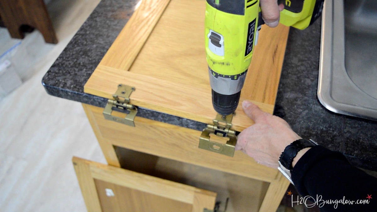 removing cabinet hardware using a drill