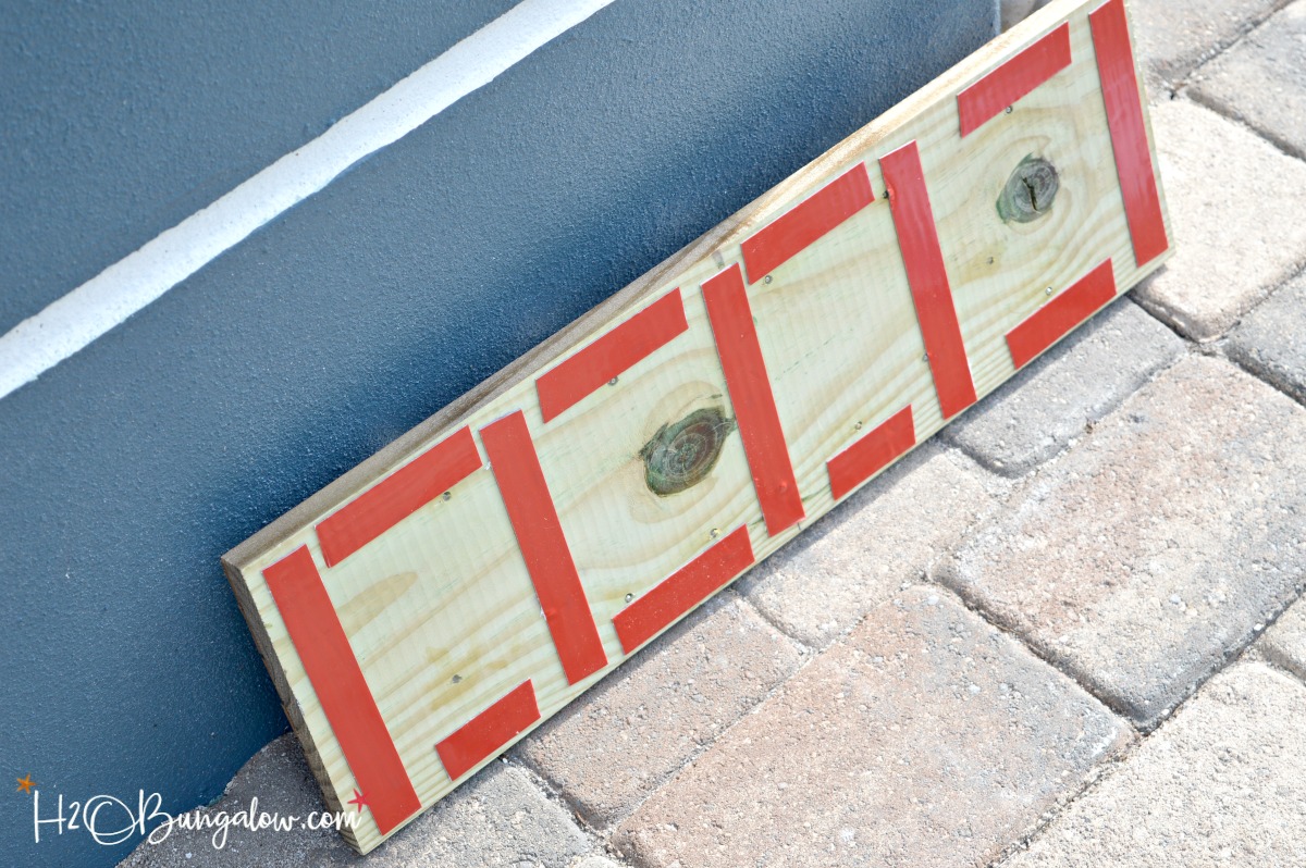 Add instant curb appeal. Easy modern DIY Horizontal Wood Slat Address Plaque Tutorial. Use only a jigsaw, glue and outdoor mounting tape. Drill optional to float letters. 