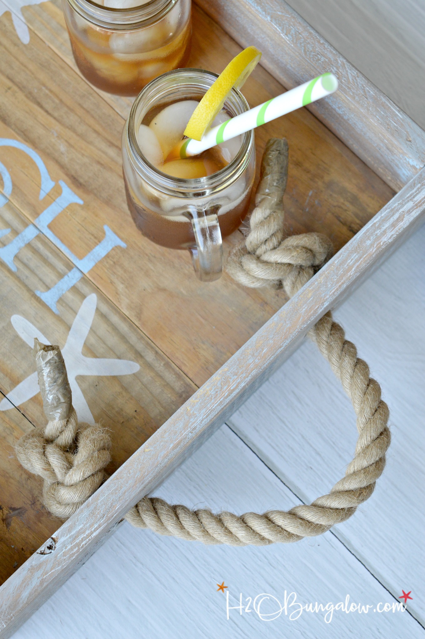 Easy tutorial to make a coastal style starfish DIY rope handle tray. Complete this project in a few hours. Follow simple steps and tips to finish your serving tray in a coastal, farmhouse or rustic style wood serving tray. Find 400+ home decor and home improvement projects at H2OBungalow.com 