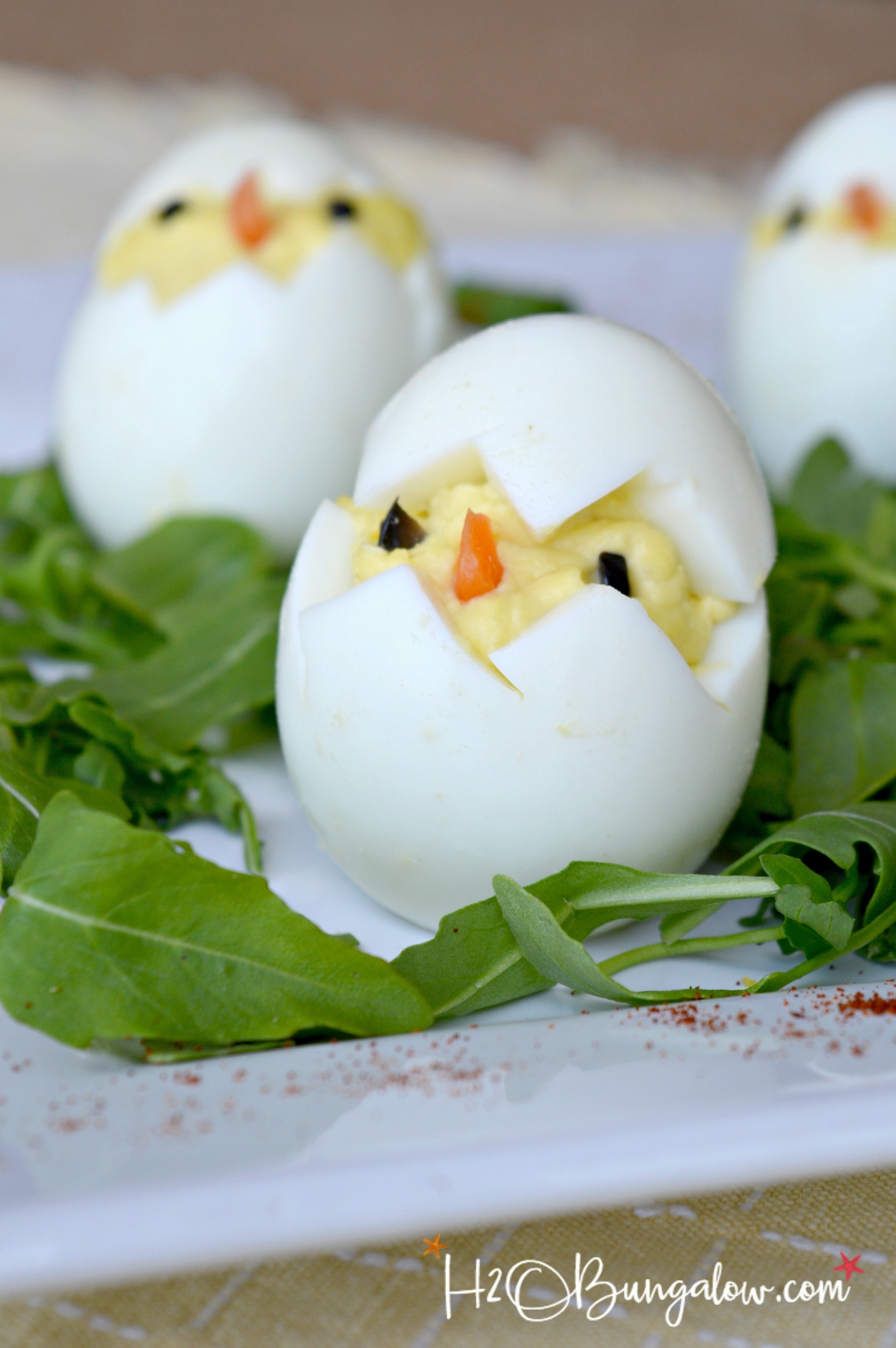Easy to make deviled egg easter chick recipe and tutorial. They aren't hard to make but knowing a few tricks on how to make these cute chick deviled eggs is a must! Find them here at H2OBungalow
