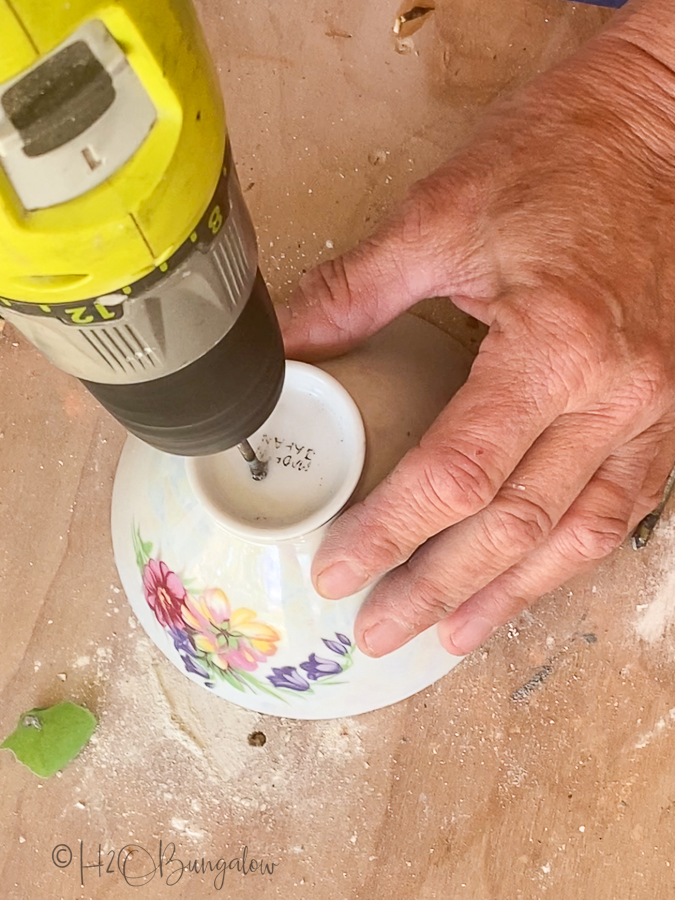 drilling a drain hole in bottom of tea cup 