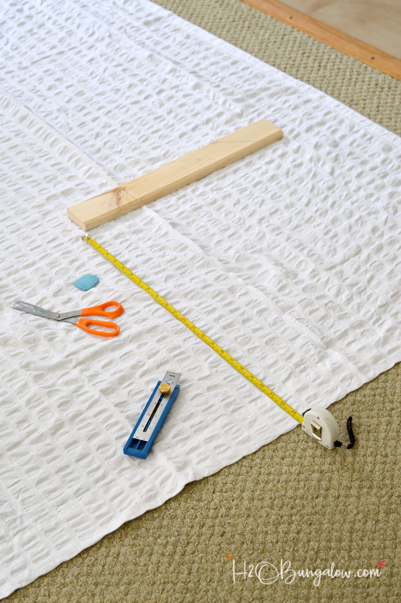 No sew curtain hemming tutorial using Heat n Bond. Fast and easy DIY way to get custom curtain length quickly without lugging out the sewing machine 