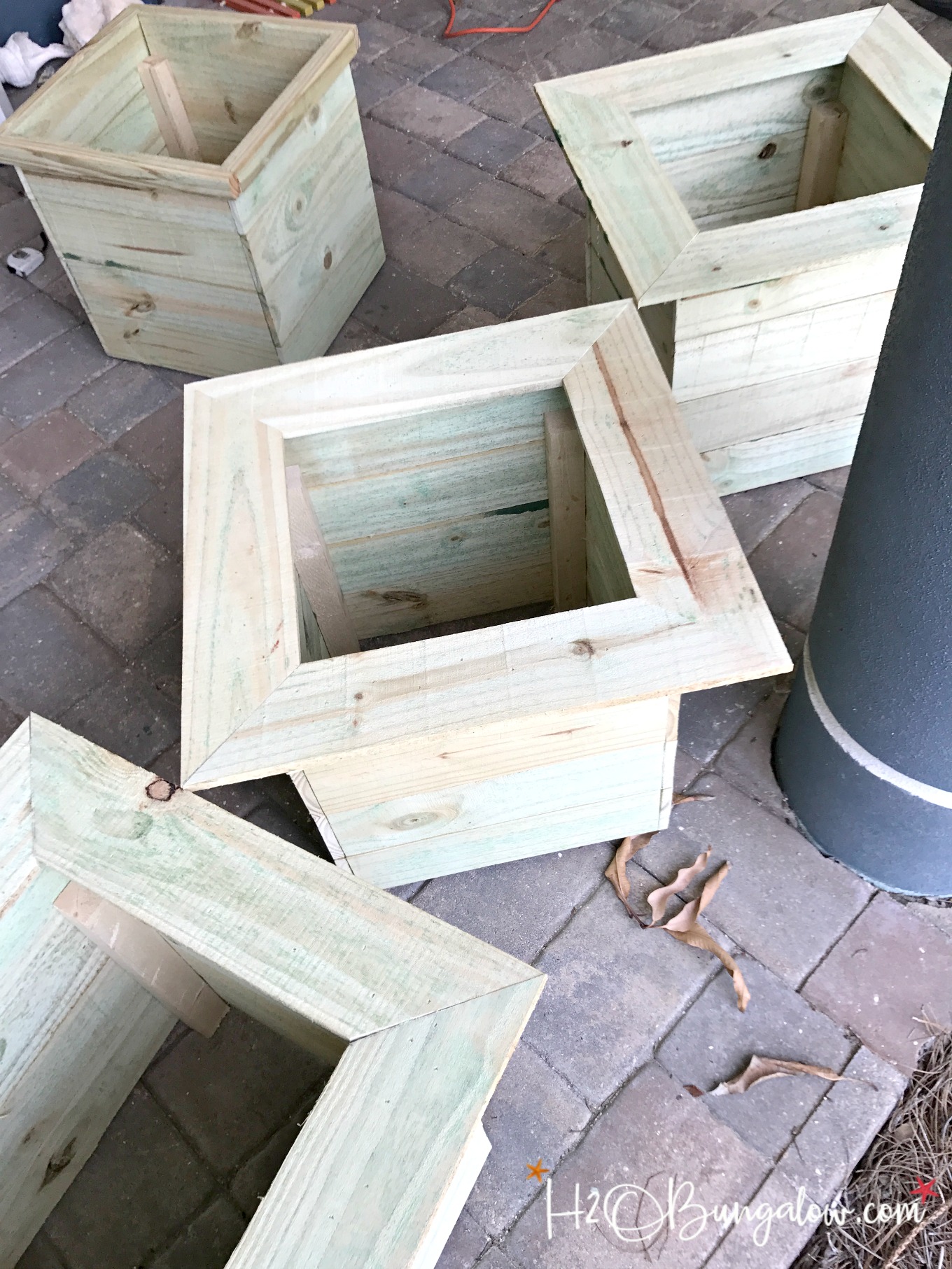 set of four wood blocks shown with collar