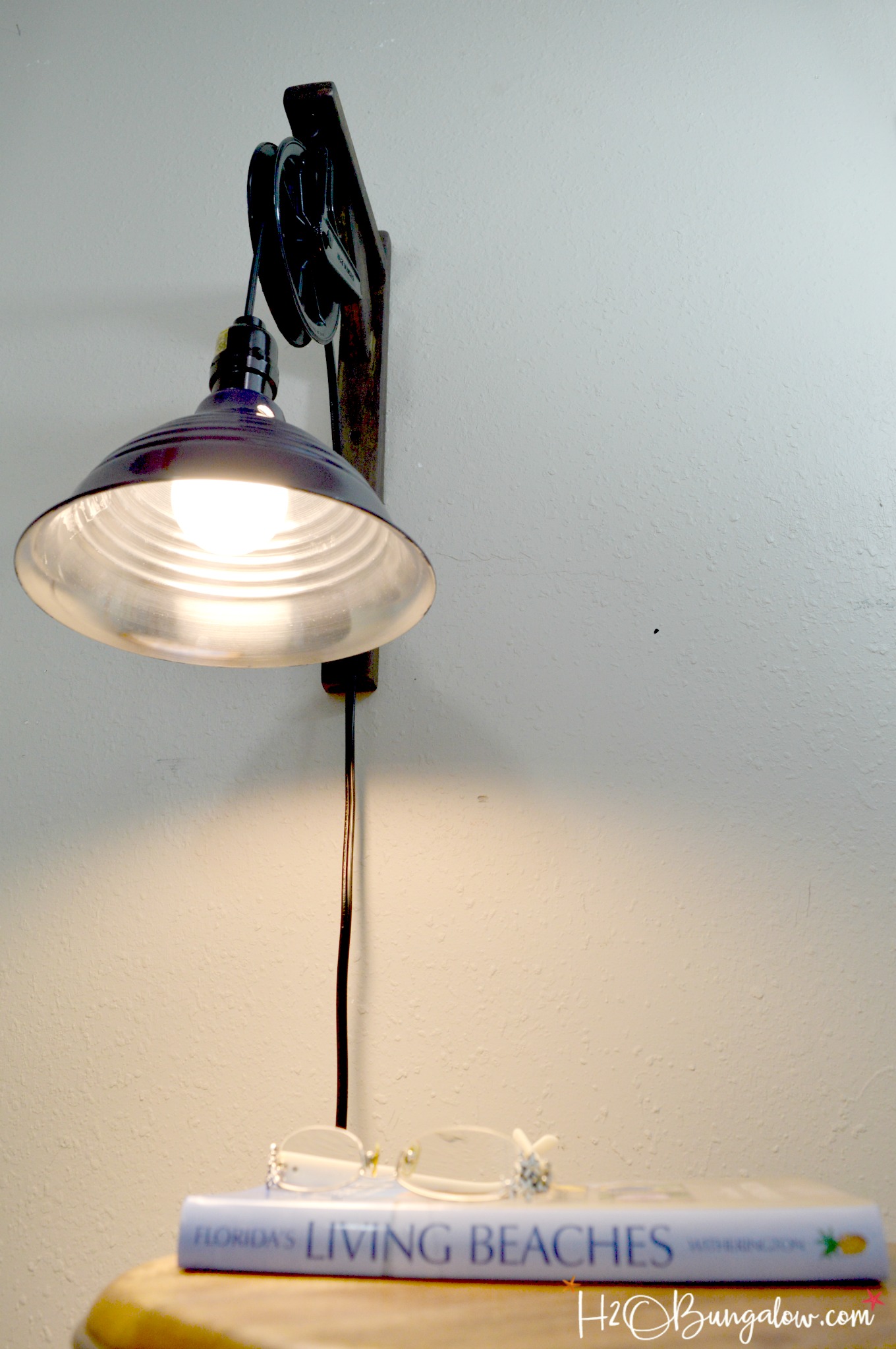  Use this wall sconce tutorial DIY vintage style pulley light to make a fabulous home decor piece for under $15! Looks just like an upscale store version.
