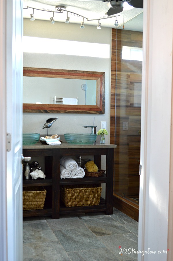 Five inspiring before and after bathroom makeovers from a DIY Blogger. Includes coastal, farmhouse and contemporary bathroom makeover and remodel ideas with tutorials. Find over 450 home improvement and home decor tutorials on H2OBungalow.com
