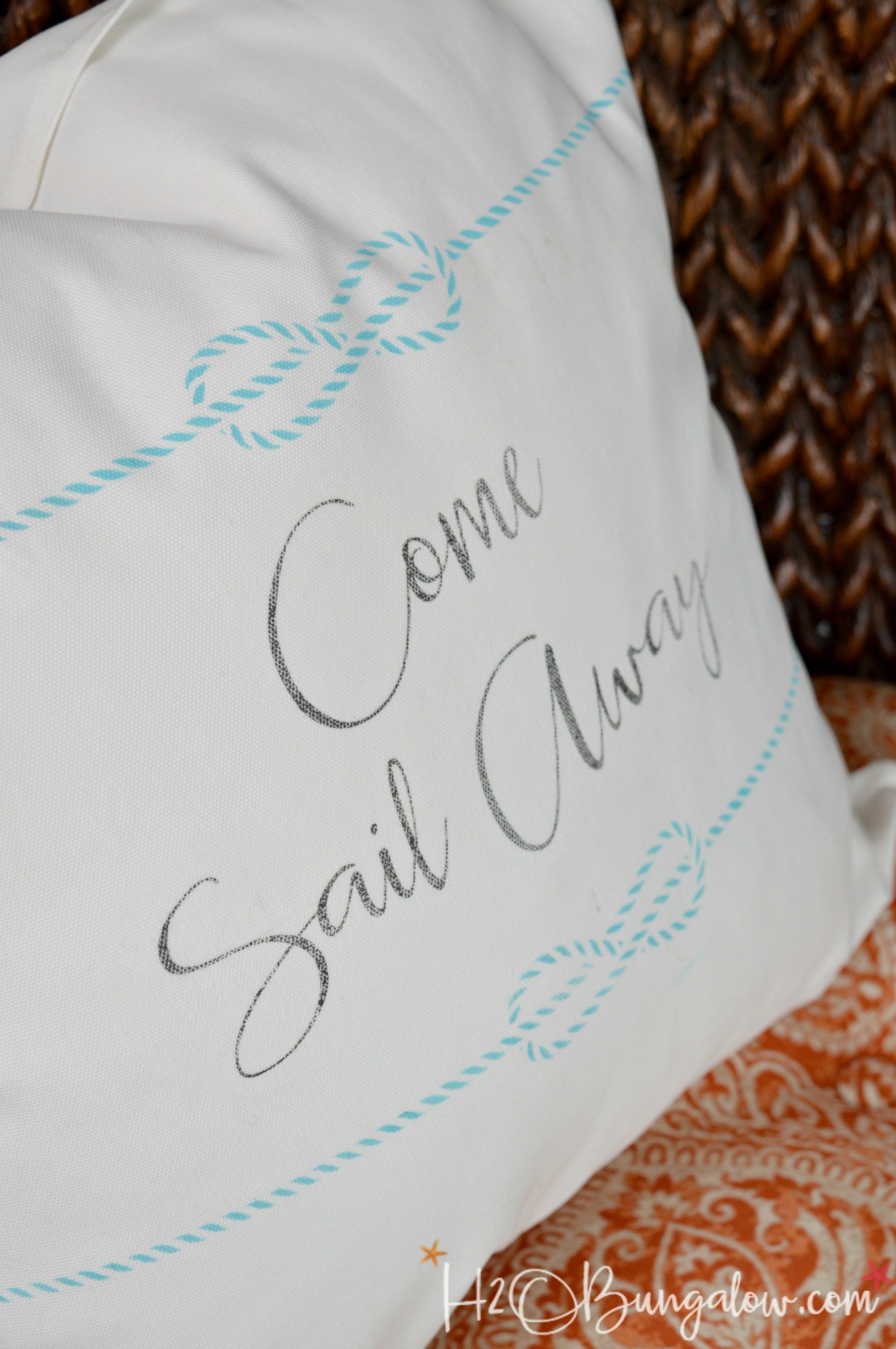 Easy to make DIY nautical come sail away pillow tutorial made with stencil and iron on. Make a sailing themed summer pillow. Download the free graphic in this post Find over 450 DIY home decor and home improvement tutorials on H2OBungalow.com 